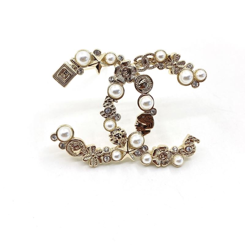 Ch*el brooches